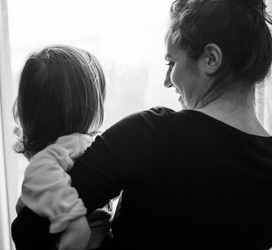 mother holding a baby