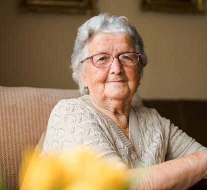 old woman sitting on chair