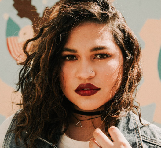 Youth young woman wearing dark lipstick with long hair