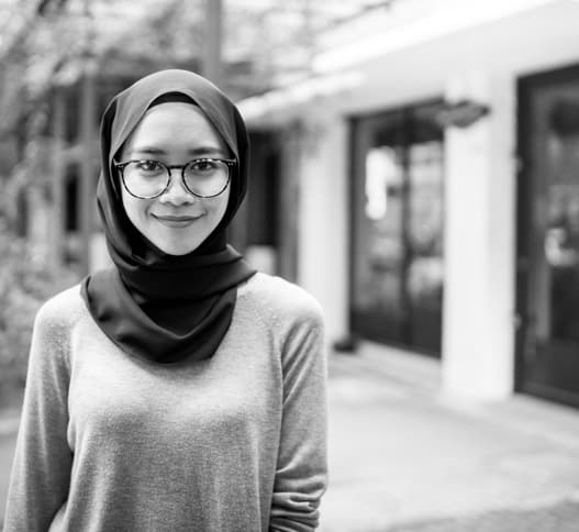 young woman with glasses
