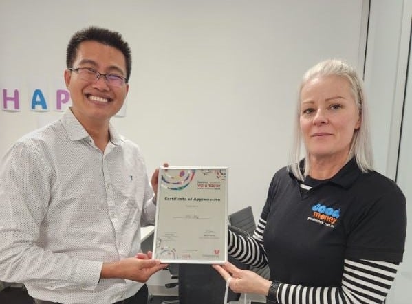 Volunteer Paul Mey recieving Volunteering certificate